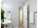 Bathroom with modern black hardware and a convenient towel rack at 28432 Tammi Dr, Tavares, FL 32778