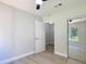 Bedroom featuring new light fixture and a view to the exterior at 28432 Tammi Dr, Tavares, FL 32778