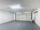 Clean, spacious garage with an automatic door and ample space for parking and storage at 28432 Tammi Dr, Tavares, FL 32778