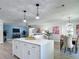 Bright, open living space combining kitchen, dining, and living areas for modern, connected living at 28432 Tammi Dr, Tavares, FL 32778