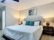 Cozy main bedroom featuring stylish decor and comfortable bed at 28432 Tammi Dr, Tavares, FL 32778