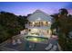 Back of house featuring a sparkling pool, spacious deck, and a balcony at 3110 John Anderson Dr, Ormond Beach, FL 32176