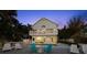 Inviting backyard with a sparkling pool, lounge chairs, and a deck for relaxation and enjoyment at 3110 John Anderson Dr, Ormond Beach, FL 32176