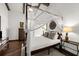 Bedroom with high ceilings, hardwood floors, stylish decor, and a canopy bed at 3110 John Anderson Dr, Ormond Beach, FL 32176