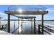 A boat lift showcasing waterfront living and clear water views at 3110 John Anderson Dr, Ormond Beach, FL 32176