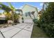 Charming home exterior with a well-manicured lawn and ample parking at 3110 John Anderson Dr, Ormond Beach, FL 32176