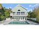Beautiful backyard showcasing a well-maintained pool and lush surroundings at 3110 John Anderson Dr, Ormond Beach, FL 32176