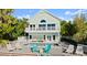 Charming two-story home featuring a pool, deck, and second story balcony at 3110 John Anderson Dr, Ormond Beach, FL 32176