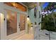 Charming front entrance with decorative glass doors, lush greenery, and a coastal feel at 3110 John Anderson Dr, Ormond Beach, FL 32176