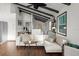 Living room featuring neutral decor, comfortable seating, and bright natural lighting at 3110 John Anderson Dr, Ormond Beach, FL 32176