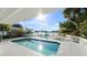 Sparkling pool with waterfront views and inviting lounge area at 3110 John Anderson Dr, Ormond Beach, FL 32176
