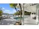 Backyard pool with lounge chairs and waterfront view at 3110 John Anderson Dr, Ormond Beach, FL 32176