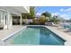 Backyard pool area, providing a relaxing outdoor experience at 3110 John Anderson Dr, Ormond Beach, FL 32176