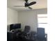 Home office space with a modern desk, ergonomic chair, and ample lighting at 3339 Croton Ave, Deltona, FL 32738