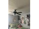 Inviting bedroom with a ceiling fan and eclectic wall decorations at 3339 Croton Ave, Deltona, FL 32738