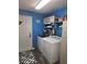 Bright laundry room features a modern washer and dryer and ample storage space at 3339 Croton Ave, Deltona, FL 32738