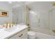 Updated bathroom featuring a glass shower, gold fixtures, a tiled wall, and marble countertops at 3988 Radley Ct, Longwood, FL 32779