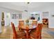 Charming dining area with a round table, seating four, and a built-in bar for stylish entertaining at 3988 Radley Ct, Longwood, FL 32779