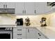 Well-appointed kitchen showcasing sleek appliances, modern countertops, and ample storage space creating a functional and stylish culinary space at 3988 Radley Ct, Longwood, FL 32779