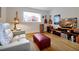 Cozy living room with comfortable seating, a window view, and entertainment setup, perfect for relaxing or entertaining at 3988 Radley Ct, Longwood, FL 32779