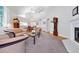 Spacious living room with an open layout, fireplace, vaulted ceilings, hardwood floors, and neutral tones creating a peaceful ambiance at 3988 Radley Ct, Longwood, FL 32779