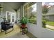 Relaxing sun room with bright windows, comfortable seating, and refreshing views of the outdoors at 3988 Radley Ct, Longwood, FL 32779