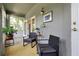 Inviting sunroom featuring comfortable seating and a bright, airy atmosphere with a view of the outdoors at 3988 Radley Ct, Longwood, FL 32779