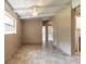 Bright dining area with modern flooring and a view into an adjacent room at 442 Dorothy Ave, Daytona Beach, FL 32117