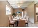 Cozy dining room with seating for six, featuring bright natural light and stylish decor at 442 Dorothy Ave, Daytona Beach, FL 32117