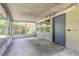 Screened-in porch, a versatile space that provides an opportunity to create an outdoor living area at 442 Dorothy Ave, Daytona Beach, FL 32117