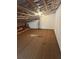 Large unfinished attic space with exposed beams, ideal for storage or future expansion at 79 Cypress Pond Rd # 79, Port Orange, FL 32128