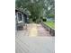 Backyard featuring a walkway and green space at 79 Cypress Pond Rd # 79, Port Orange, FL 32128