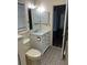 Bathroom featuring vanity with marble countertop, a sink and storage at 79 Cypress Pond Rd # 79, Port Orange, FL 32128