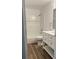 Updated bathroom with a white vanity, new fixtures, shower and tub at 79 Cypress Pond Rd # 79, Port Orange, FL 32128