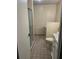 Bathroom featuring tile flooring, a toilet, and a shower at 79 Cypress Pond Rd # 79, Port Orange, FL 32128
