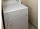Clean, white dryer with easy-to-use knobs for adjusting settings at 79 Cypress Pond Rd # 79, Port Orange, FL 32128