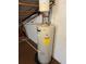 Modern, efficient hot water heater in unfinished basement area at 79 Cypress Pond Rd # 79, Port Orange, FL 32128