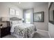 Bedroom with a queen-size bed and calming decor at 2175 Aibonito Cir, Clermont, FL 34711