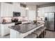 Modern kitchen with stainless steel appliances and island at 2175 Aibonito Cir, Clermont, FL 34711