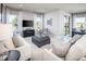 Spacious living room with access to outdoor patio at 2175 Aibonito Cir, Clermont, FL 34711