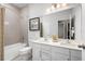 Clean bathroom with double vanity and a bathtub at 746 Copper Creek Dr, New Smyrna Beach, FL 32168