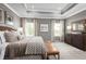 Spacious main bedroom with a comfortable bed and plenty of natural light at 746 Copper Creek Dr, New Smyrna Beach, FL 32168
