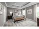 Large main bedroom with coffered ceiling and neutral decor at 746 Copper Creek Dr, New Smyrna Beach, FL 32168