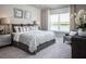 Spacious bedroom with lake view and plush bedding at 294 Prickly Pear Ct, Lady Lake, FL 32159