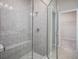 Spacious walk-in shower with built-in bench seating at 294 Prickly Pear Ct, Lady Lake, FL 32159