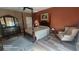 Cozy bedroom featuring a four-poster bed, dresser with mirror, ceiling fan, and warm decor at 2719 Brookline Ave, New Smyrna Beach, FL 32168