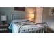 Cozy bedroom featuring a comfortable bed, soft lighting and a calm atmosphere at 2719 Brookline Ave, New Smyrna Beach, FL 32168