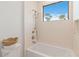 Subtle bathroom with bathtub and tiled walls at 1018 Stetson St, Orlando, FL 32804