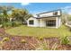 Modern two-story house with a backyard and landscaping at 1018 Stetson St, Orlando, FL 32804