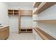 Laundry room with built-in cabinets, shelving, and a utility sink at 1018 Stetson St, Orlando, FL 32804